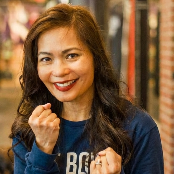 Coach Janet Bio Photo